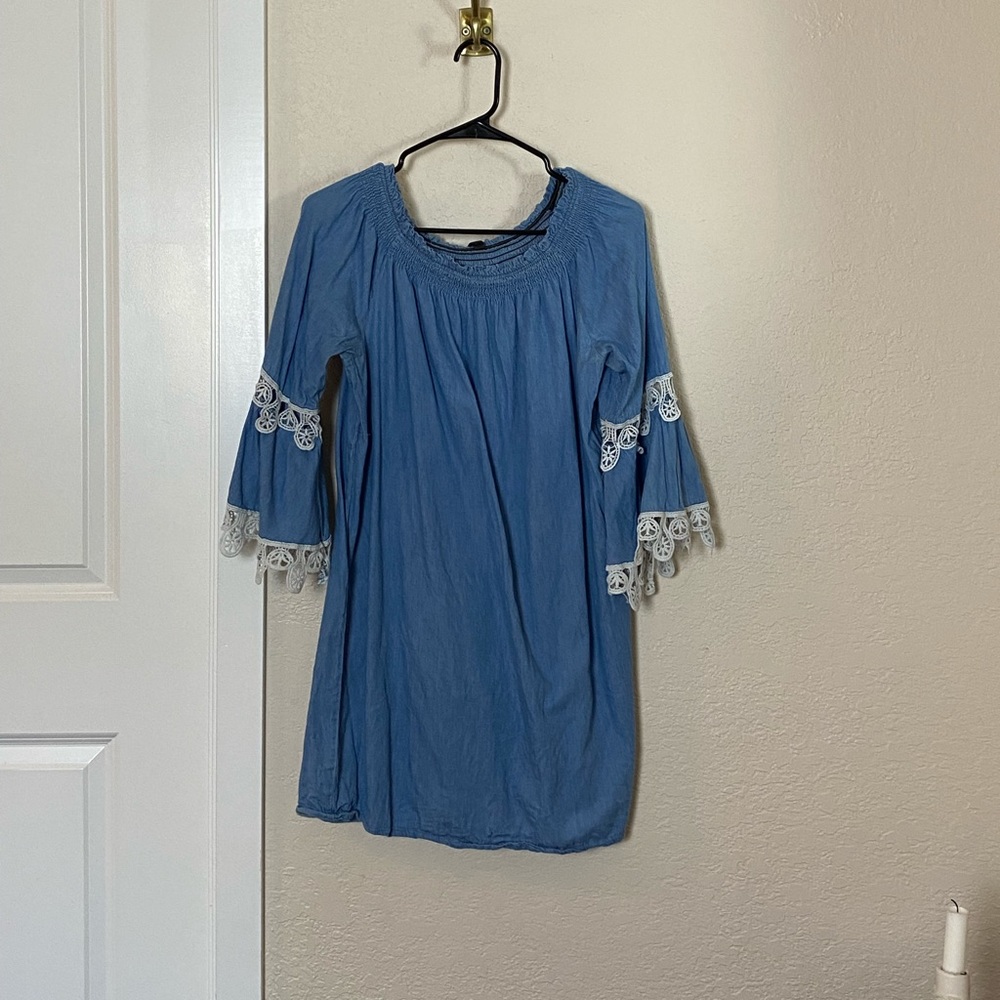 Jean dress with flare sleeves. Lightly worn.